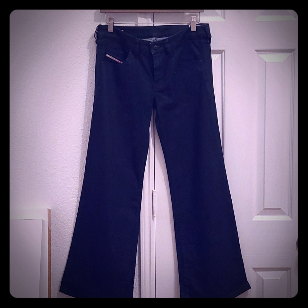 Dark wash Diesel YBO wide bottom jeans.